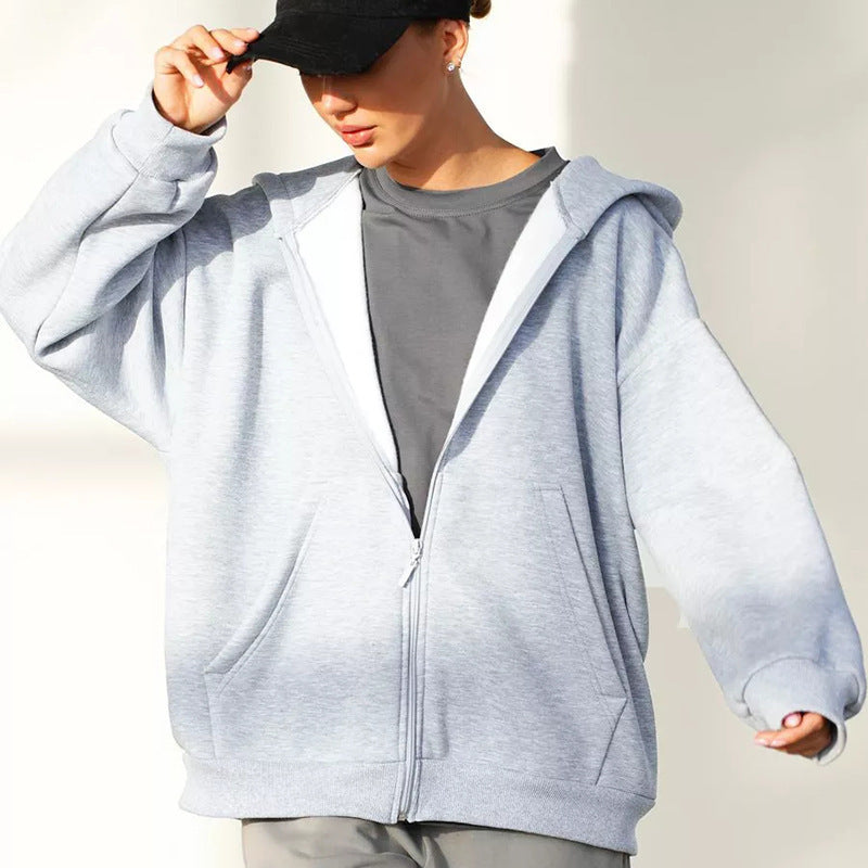 Damen oversized Kapuzenjacke mit durchgehendem Reißverschluss und großen Taschen Heidi-Mode