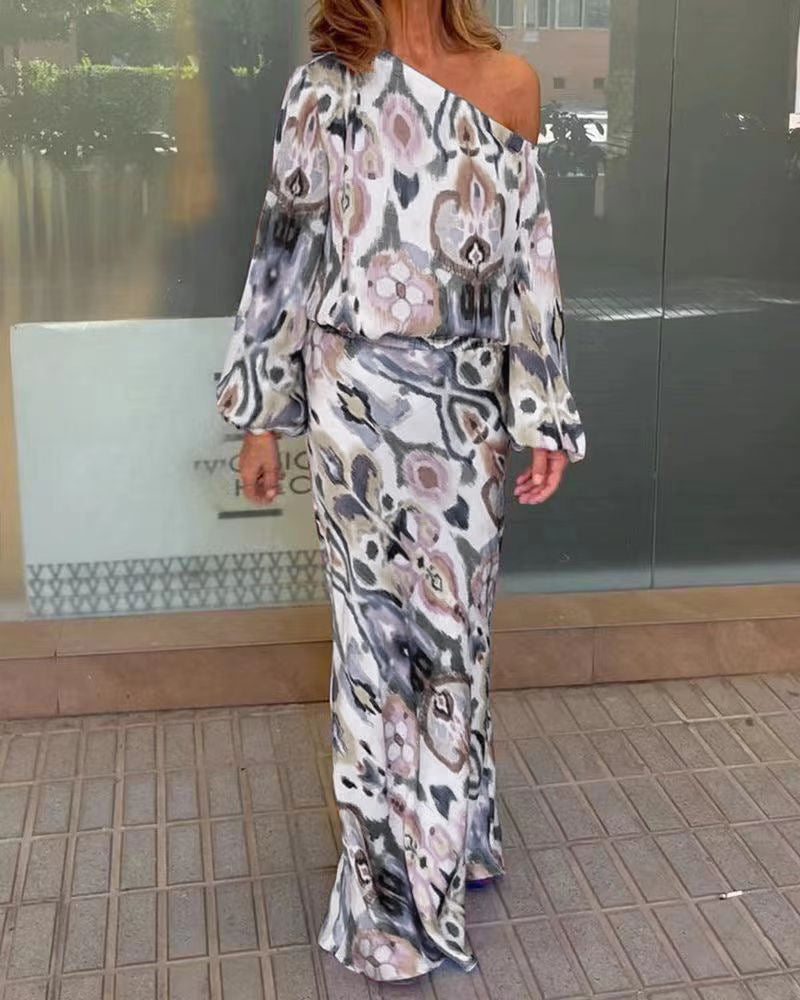 Damen Elegantes Maxikleid im grafischen Batikdesign mit Off-Shoulder-Ausschnitt und voluminösen Ärmeln Heidi-Mode