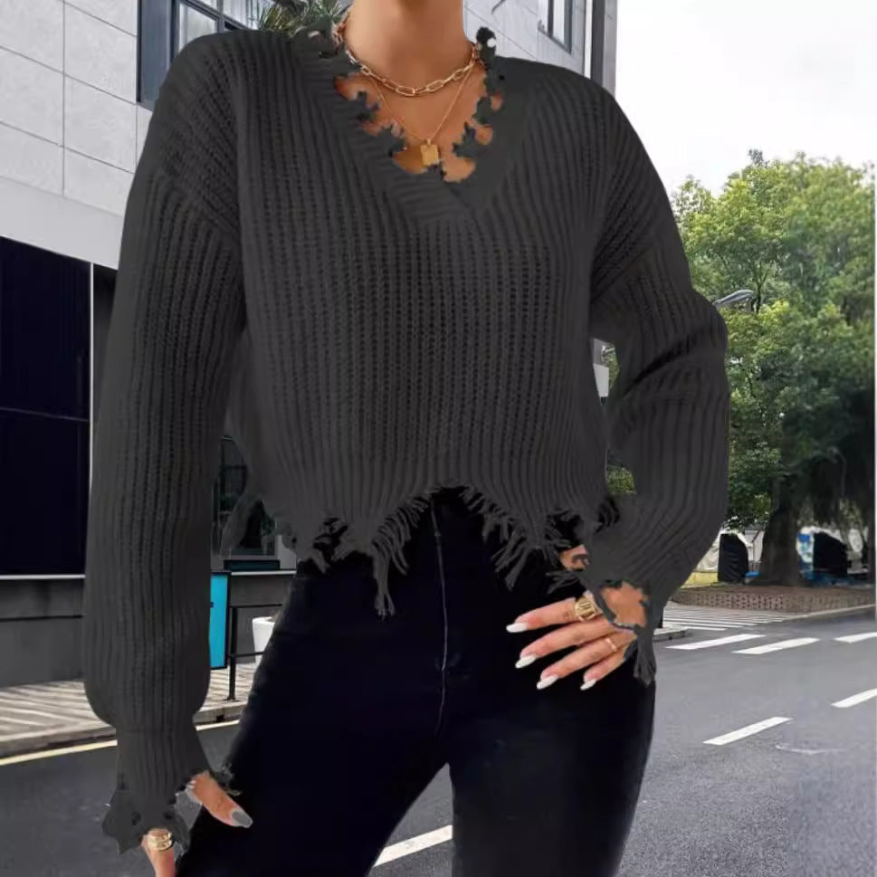 Damen Oversized Strickpullover mit fransigem Saum und raffiniertem Ausschnitt Heidi-Mode