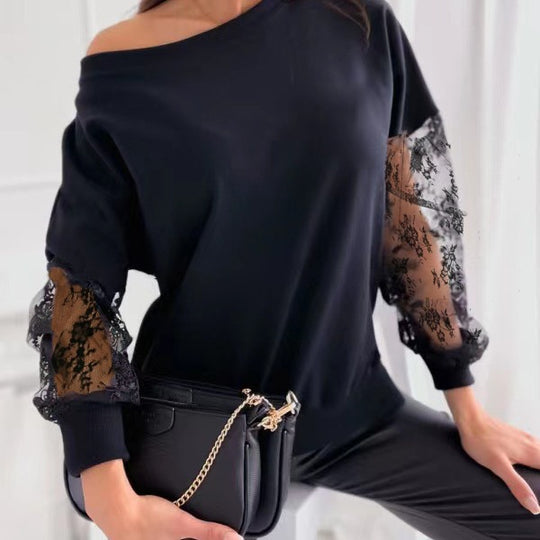 Damen eleganter Pullover mit transparenten Spitzenärmeln und asymmetrischem Ausschnitt Heidi-Mode