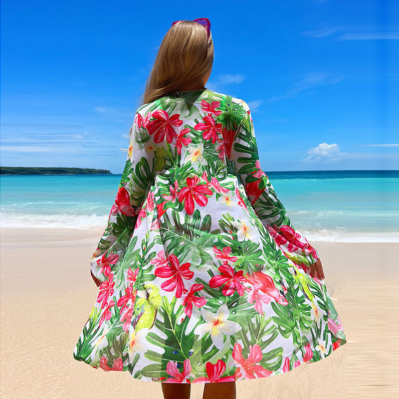 Damen Strandkleid mit floralem Muster und leichter Transparenz Heidi-Mode