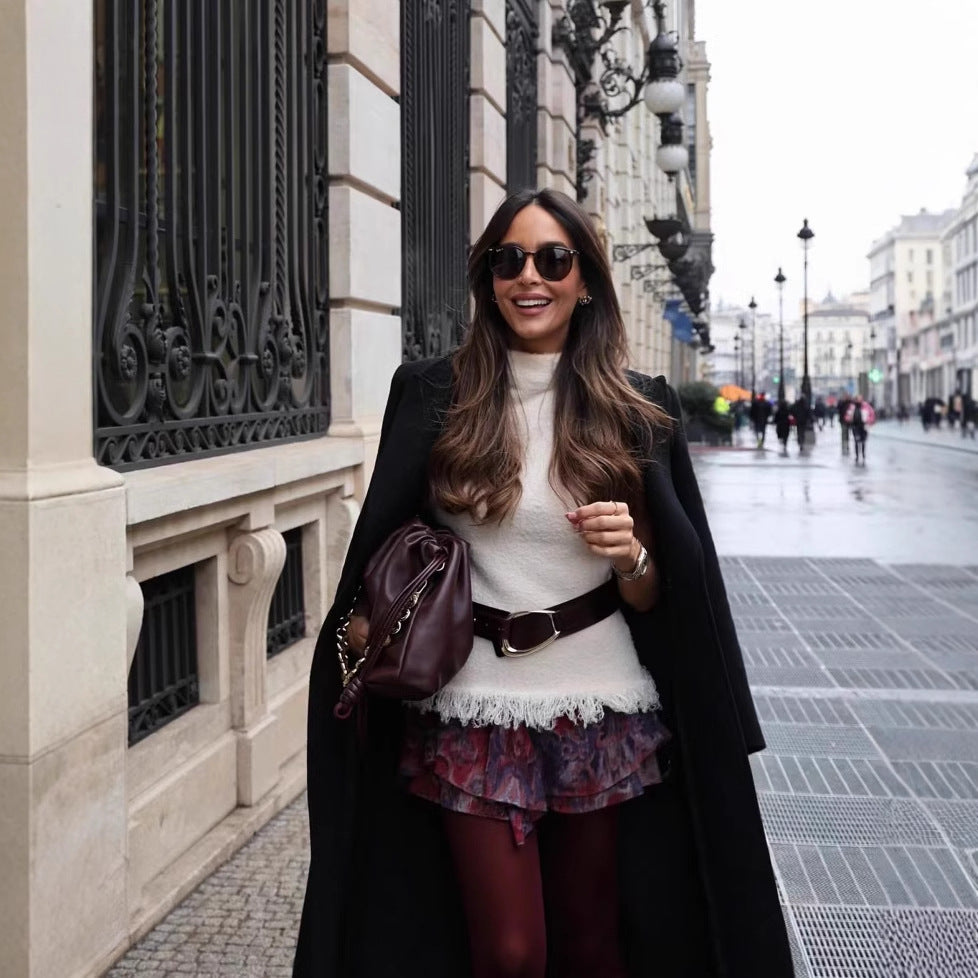 Damen ärmelloses Strickoberteil mit elegantem Stehkragen und fransigem Saum Heidi-Mode