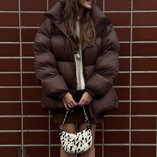 Damen Steppjacke im oversized Schnitt mit hohem Kragen und Taschen Heidi-Mode