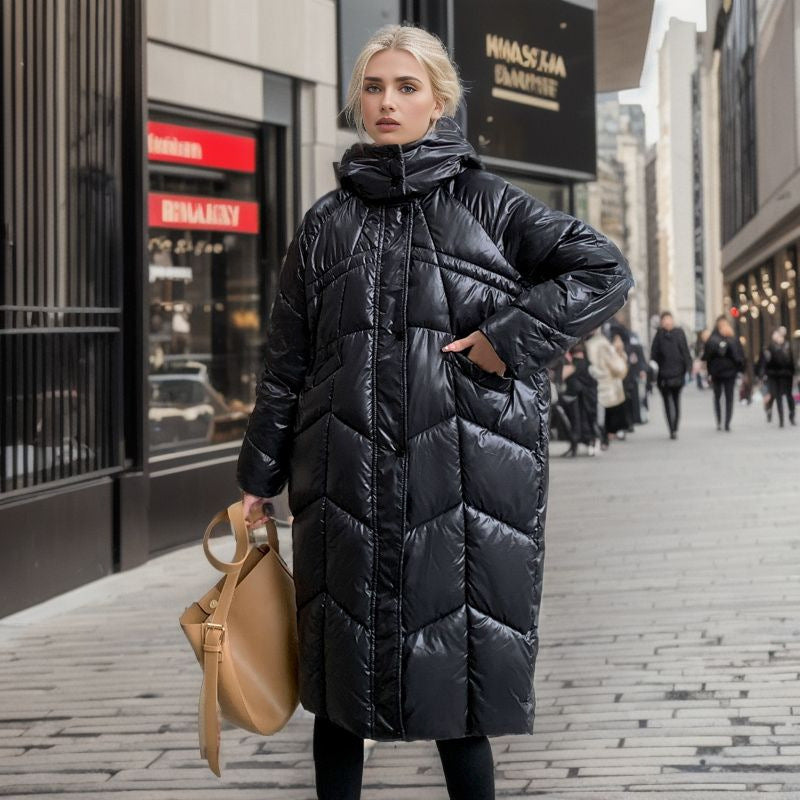 Damen lange isolierte Pufferjacke mit voluminösem Schnitt und praktischen Eingrifftaschen Heidi-Mode