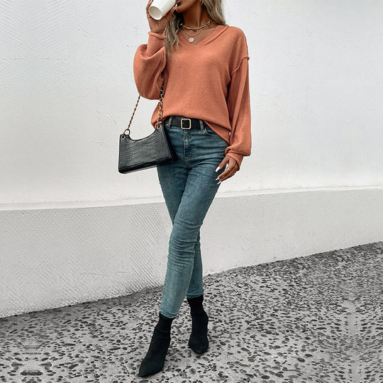 Damen V-Pullover mit voluminösen Ärmeln und verspielten Details Heidi-Mode