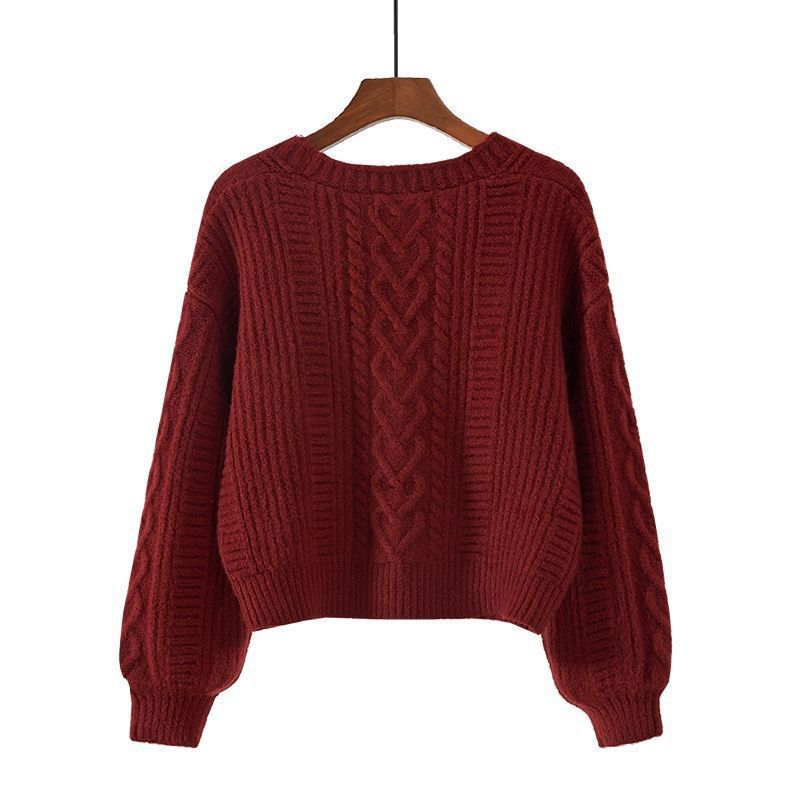 Damen Strickjacke mit ausgefallenem Zopfmuster und tiefem V-Ausschnitt Heidi-Mode
