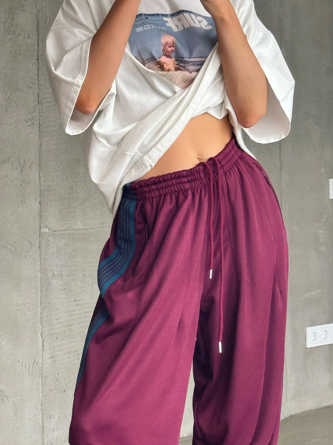 Damen weite Sporthose mit diagonalen Streifen Heidi-Mode