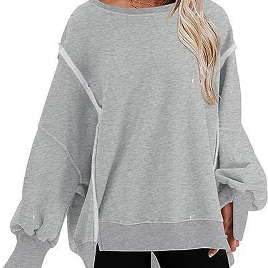 Damen Oversize Sweatshirt mit Ballonärmeln und seitlichen Schlitzen Heidi-Mode
