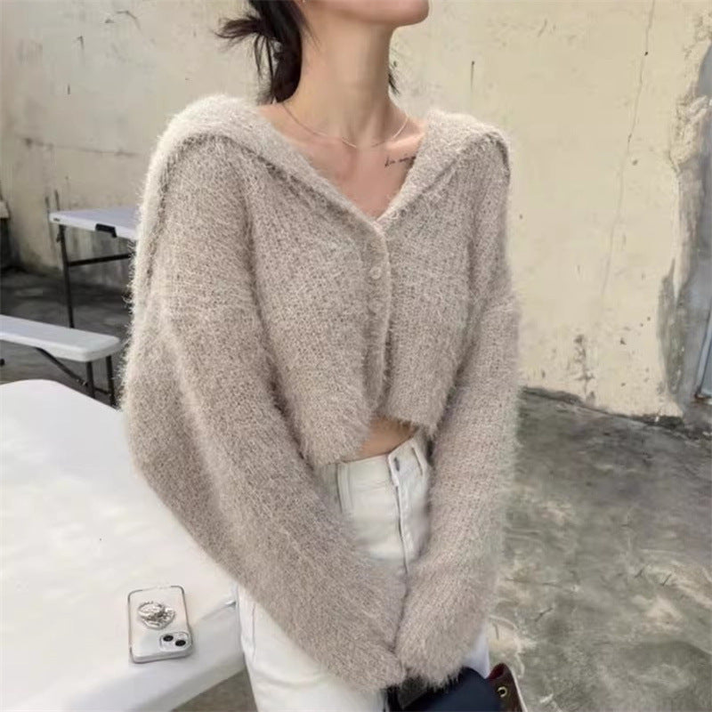 Damen lässiger Pullover mit tiefem V-Ausschnitt und strukturiertem Maschenmuster Heidi-Mode