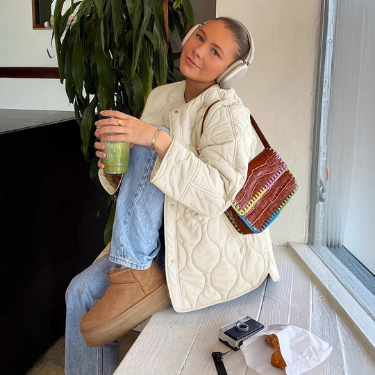 Damen Steppjacke mit großen Taschen und Rundhalsausschnitt Heidi-Mode