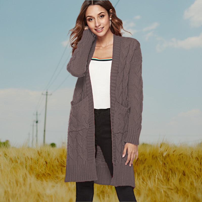 Damen Strickmantel mit großen Taschen und eleganten Zopfmustern Heidi-Mode