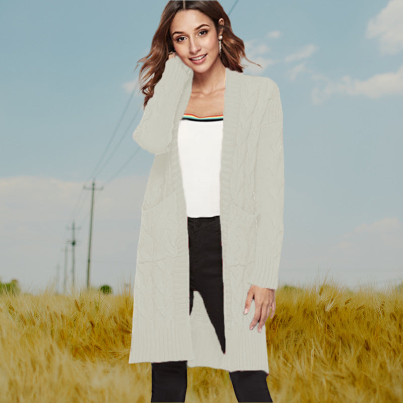 Damen Strickmantel mit großen Taschen und eleganten Zopfmustern Heidi-Mode