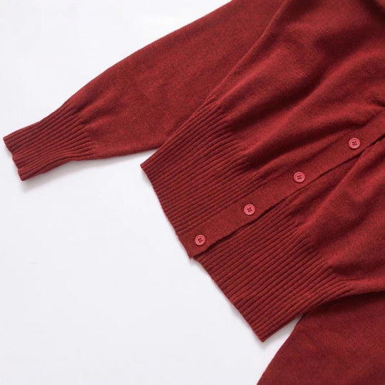 Damen modische Strickjacke mit Druckknopfverschluss und dekorativem Rüschendetail Heidi-Mode