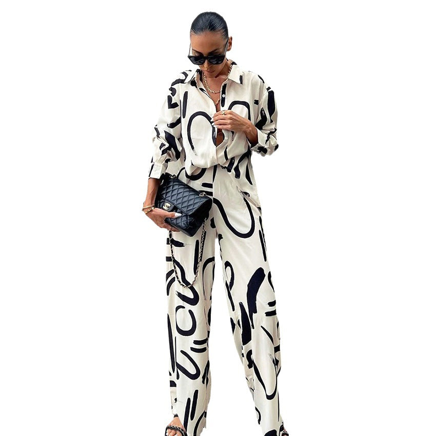 Damen elegantes Oversized Shirt und Palazzo-Hosen Set aus satinartigem Stoff mit auffälligem Muster Heidi-Mode
