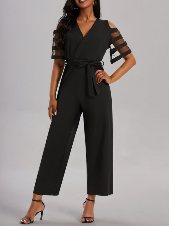 Damen Eleganter Jumpsuit mit transparenten Ärmel-Details und Taillengürtel Heidi-Mode