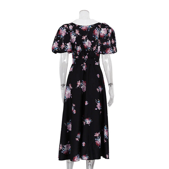 Midikleid mit floralen Akzenten und Puffärmeln