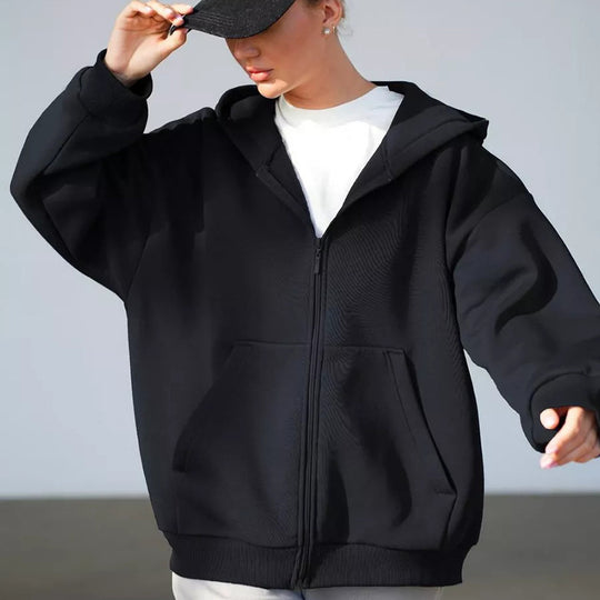 Damen oversized Kapuzenjacke mit durchgehendem Reißverschluss und großen Taschen Heidi-Mode