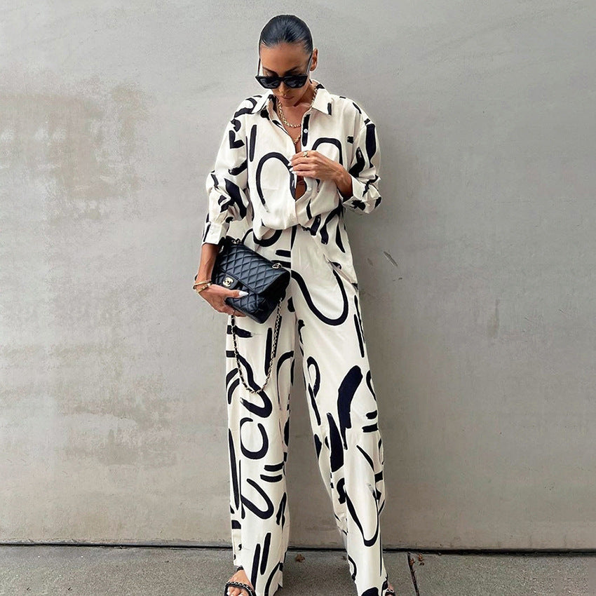 Damen elegantes Oversized Shirt und Palazzo-Hosen Set aus satinartigem Stoff mit auffälligem Muster Heidi-Mode