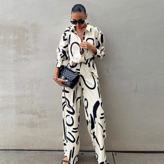 Damen elegantes Oversized Shirt und Palazzo-Hosen Set aus satinartigem Stoff mit auffälligem Muster Heidi-Mode