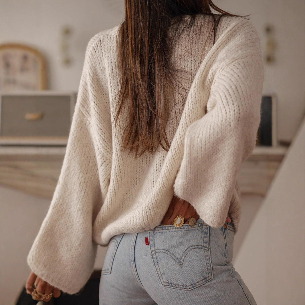 Damen kuschelige Strickjacke mit oversized Ärmeln und eleganten Perlenknöpfen Heidi-Mode