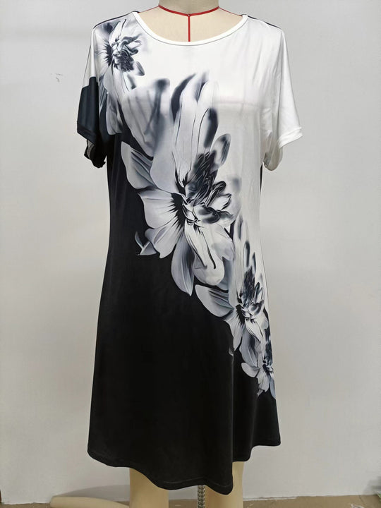 Damen Blusenkleid mit floralem Druck und kurzem Arm Heidi-Mode