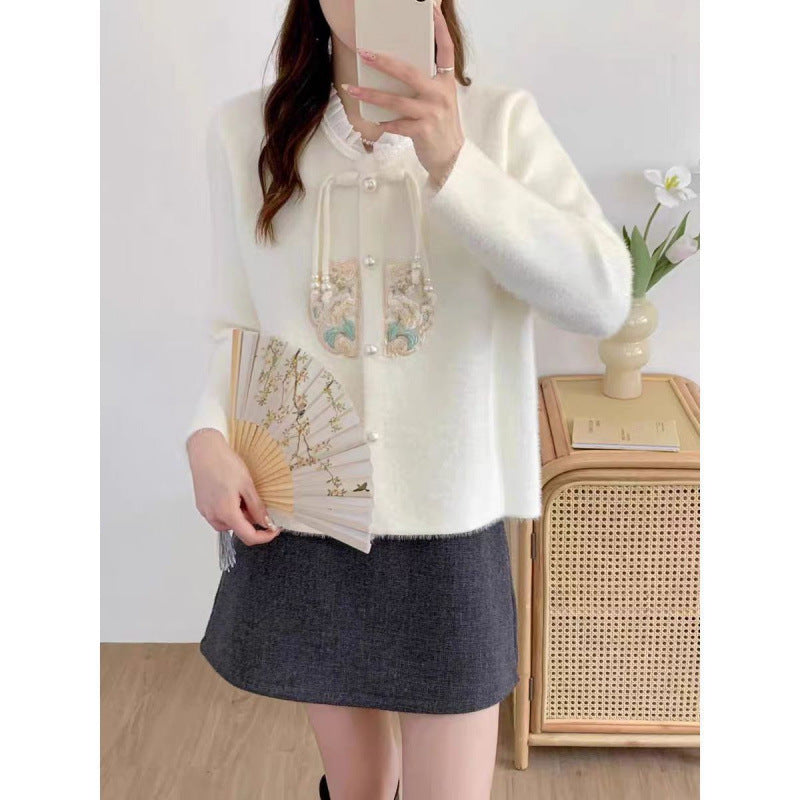 Damen Luxuriöser Strickpullover mit dekorativen Knopfdetails und Rüschen Heidi-Mode