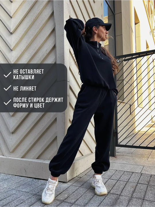 Damen sportliches Fleece-Jogginganzug mit halbem Reißverschluss und elastischen Bündchen Heidi-Mode