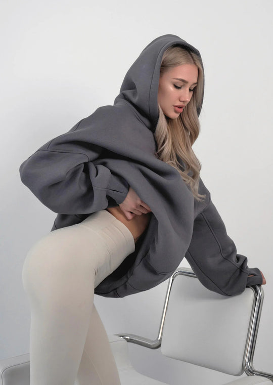 Damen oversized Kapuzenpullover mit lässigem Schnitt und Kängurutasche Heidi-Mode