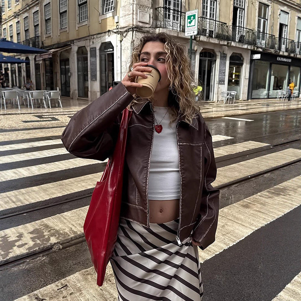 Damen cropped Kunstlederjacke mit feinen Nähten und weitem Schnitt Heidi-Mode