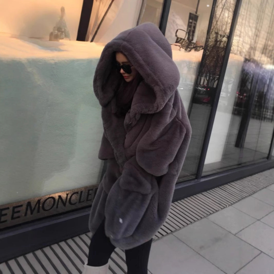 Damen Übergroßer Kunstfellmantel mit Kapuze und Taschen Heidi-Mode