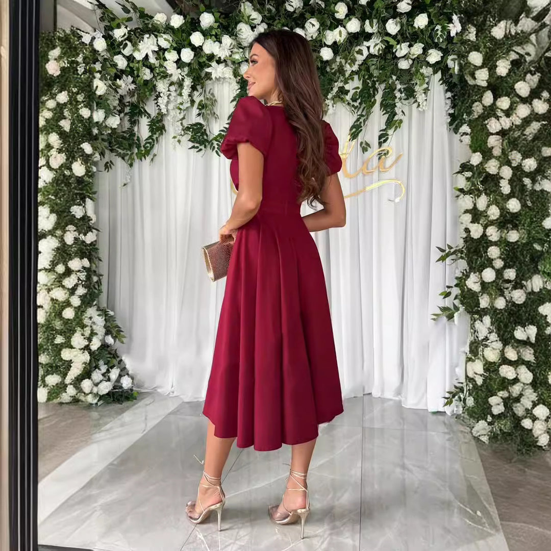 Damen A-Linie Kleid mit Puffärmeln und schmalem V-Ausschnitt Heidi-Mode