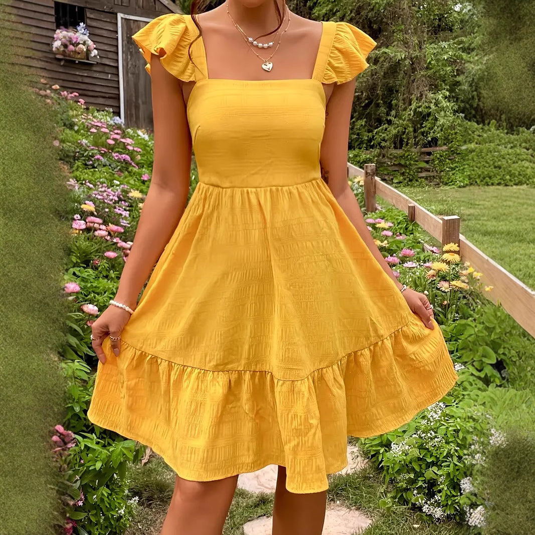 Damen luftiges Baumwollkleid mit Rüschendetails und offenen Rücken Heidi-Mode