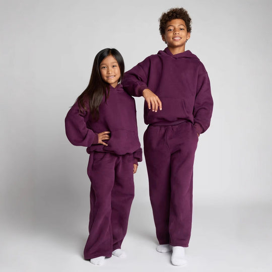 Damen lässiger Fleece-Jumpsuit mit geräumiger Kapuze und praktischen Taschen Heidi-Mode