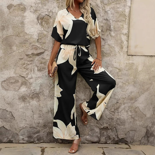 Damen Eleganter Jumpsuit mit floralen Mustern und weitem Bein Heidi-Mode