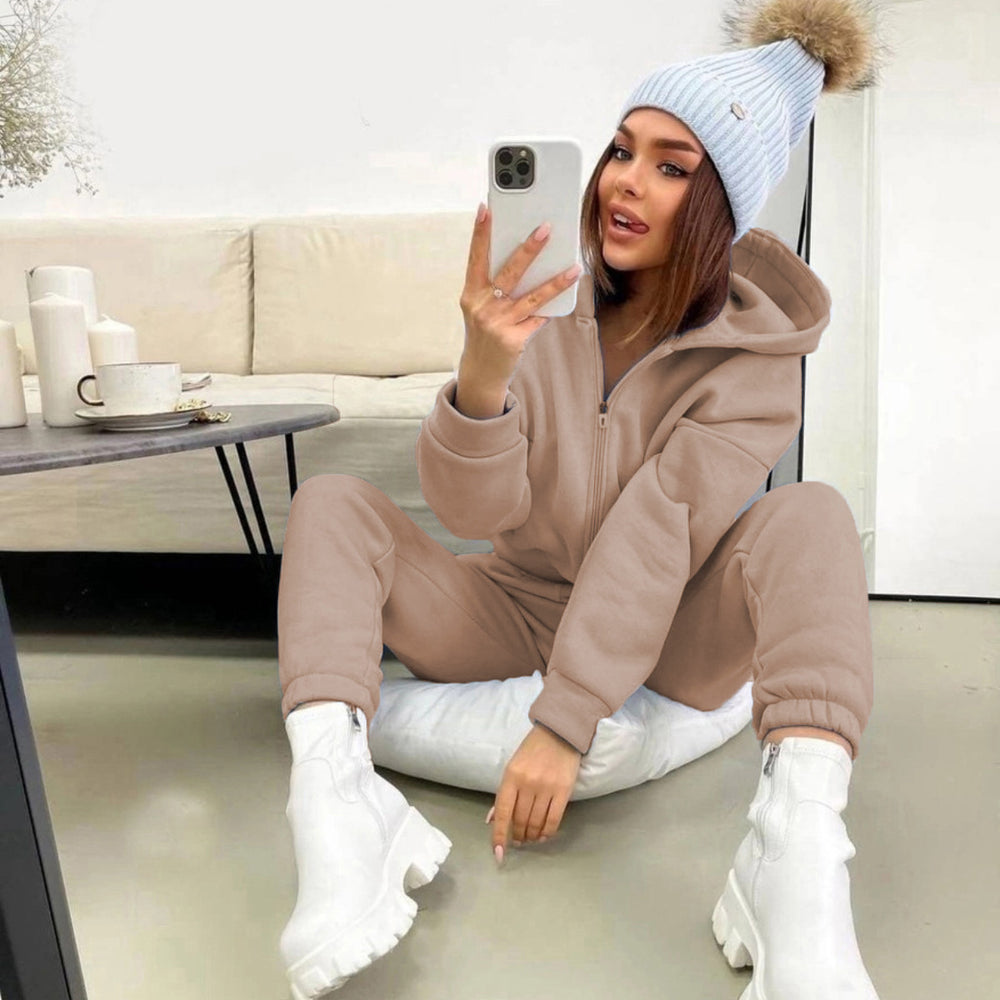 Damen Sportlicher Jumpsuit mit durchgehendem Reißverschluss und Kapuze Heidi-Mode