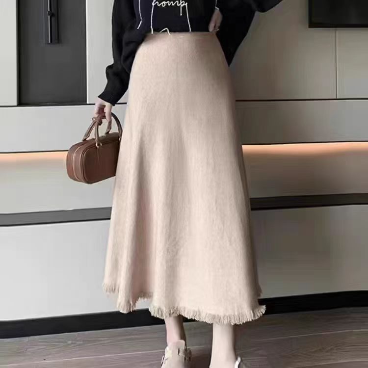 Damen Maxirock aus weichem, strukturiertem Strickstoff mit fransigem Saum Heidi-Mode