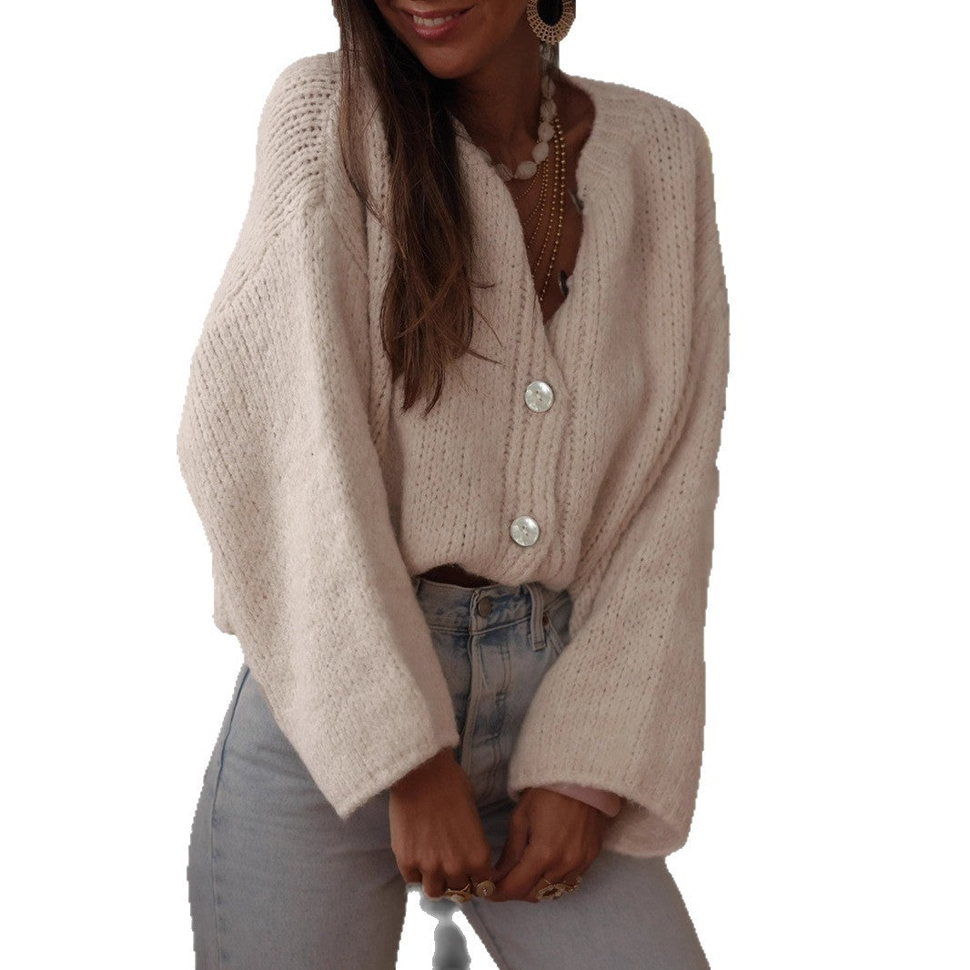 Damen kuschelige Strickjacke mit oversized Ärmeln und eleganten Perlenknöpfen Heidi-Mode