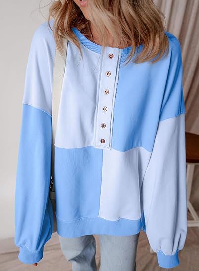 Damen lässiger Kapuzenpullover mit Knopfdetails und Farbblockdesign Heidi-Mode