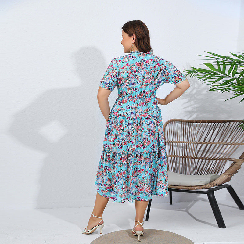 Damen Midikleid mit verspieltem Blütenmuster und voluminösem Rock Heidi-Mode