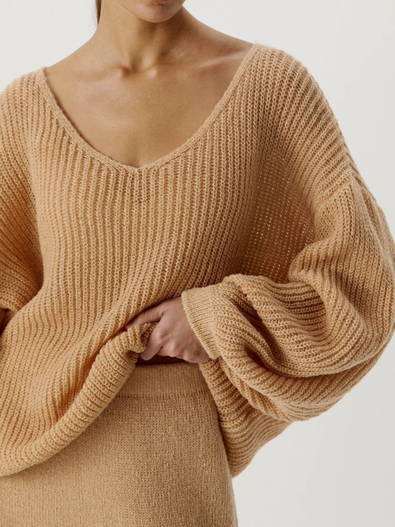 Damen lässiger Strickpullover mit weiten Ärmeln und tiefem V-Ausschnitt Heidi-Mode