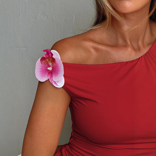 Damen Oberteil mit asymmetrischem Ausschnitt und dekorativem Blumenakzent Heidi-Mode