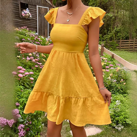 Damen luftiges Baumwollkleid mit Rüschendetails und offenen Rücken Heidi-Mode