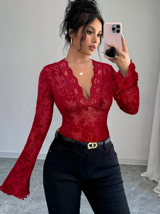Damen Elegantes Spitzenoberteil mit tiefem V-Ausschnitt und Rüschendetails Heidi-Mode