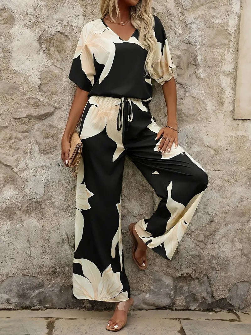 Damen Eleganter Jumpsuit mit floralen Mustern und weitem Bein Heidi-Mode