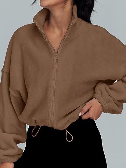 Damen Oversized Sweatjacke mit halbem Reißverschluss und Kordelzug Heidi-Mode