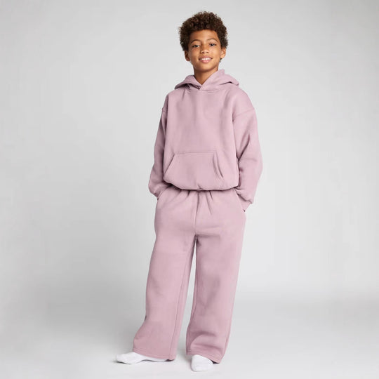 Damen lässiger Fleece-Jumpsuit mit geräumiger Kapuze und praktischen Taschen Heidi-Mode