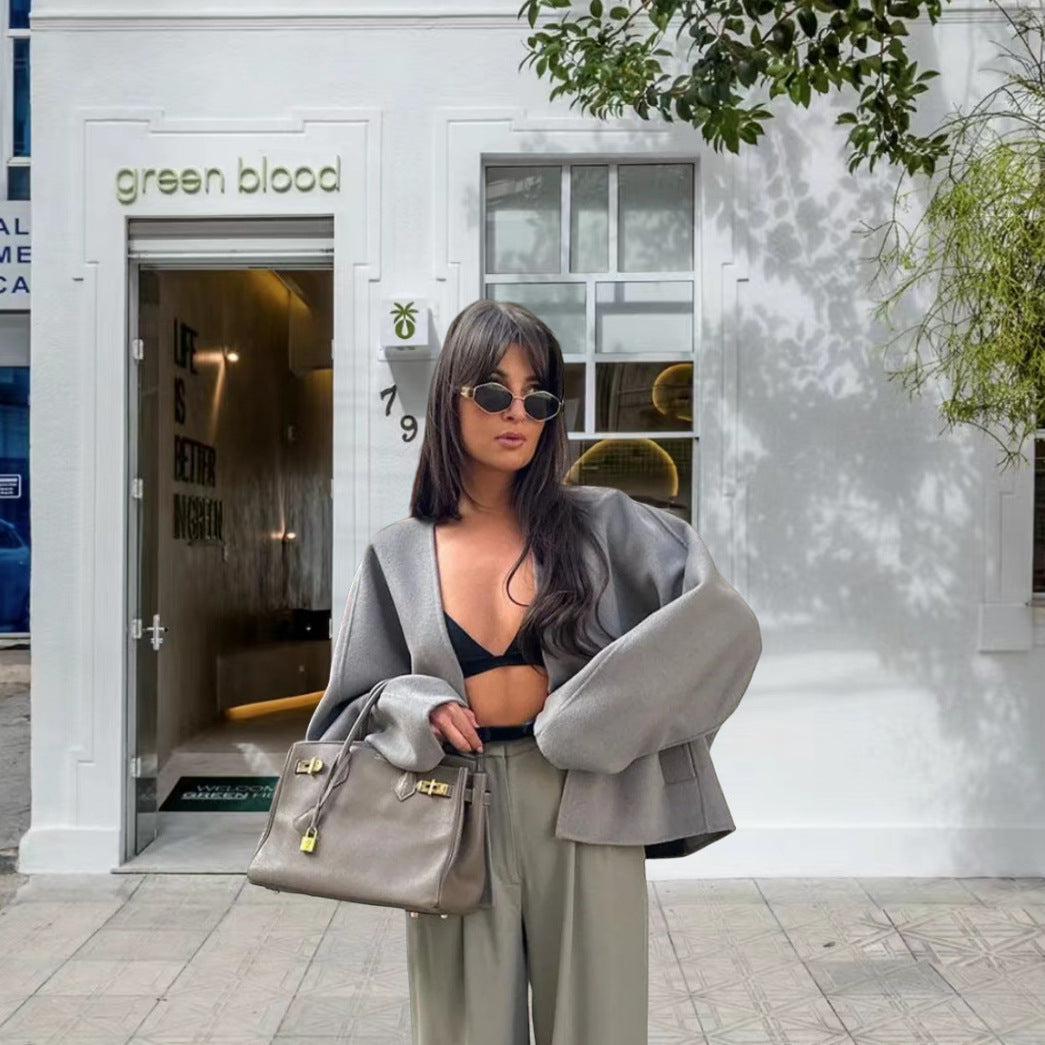 Damen kurze Strickjacke mit eleganten Knöpfen und weitem Schnitt Heidi-Mode