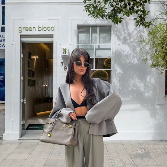 Damen kurze Strickjacke mit eleganten Knöpfen und weitem Schnitt Heidi-Mode