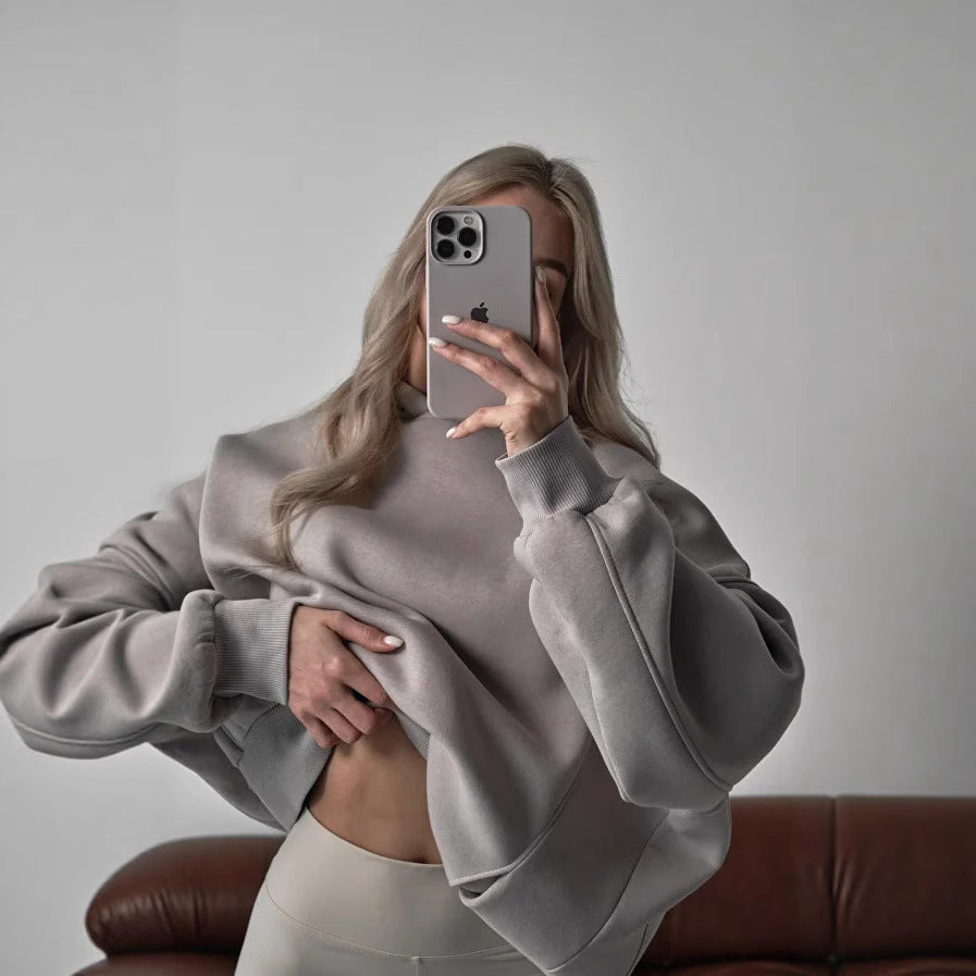 Damen oversized Kapuzenpullover mit lässigem Schnitt und Kängurutasche Heidi-Mode