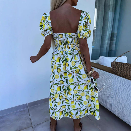 Damen Maxi Kleid mit Fruchtmotiv und Cut-Out-Details Heidi-Mode